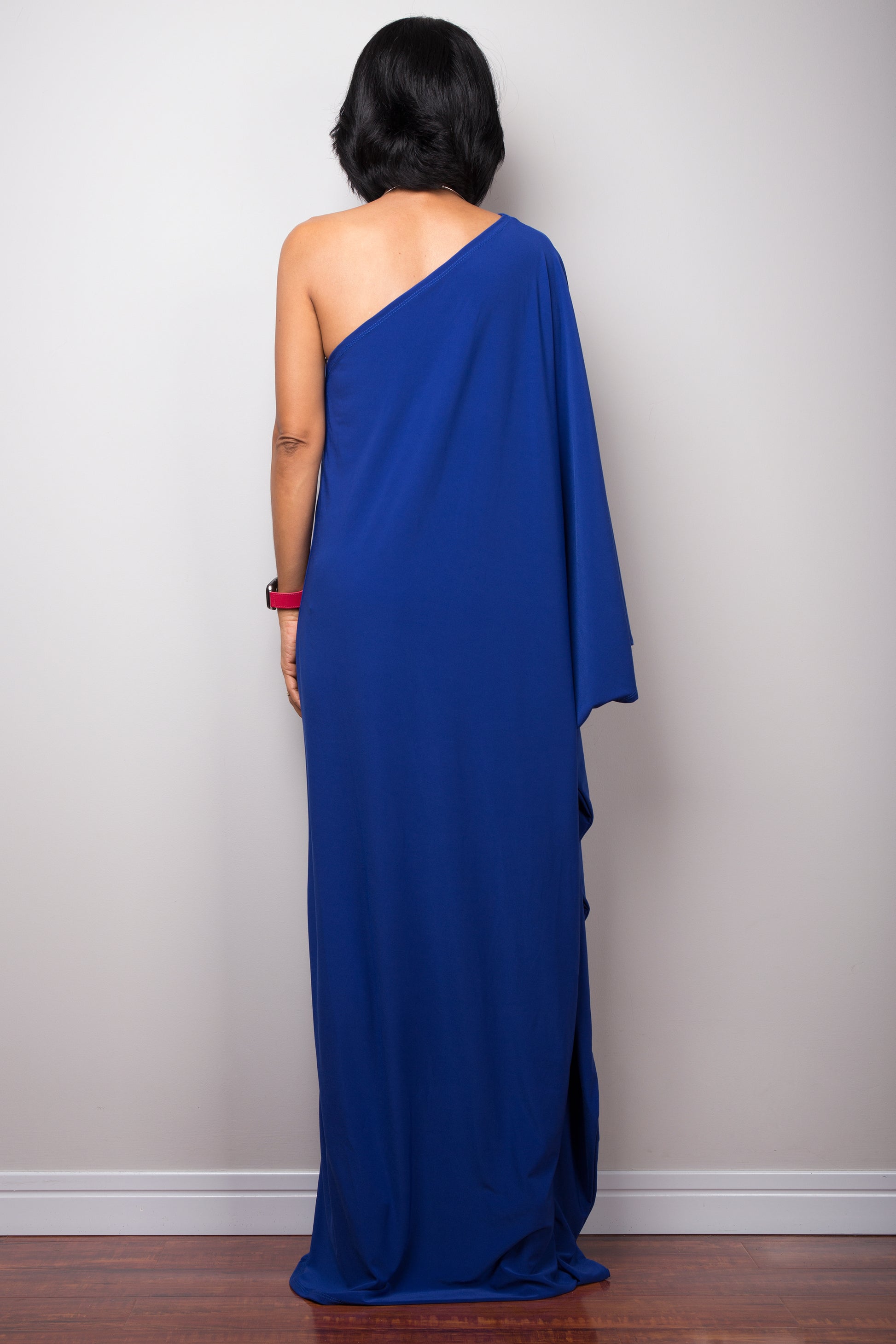 Royal blue one shoulder dress.  Back view