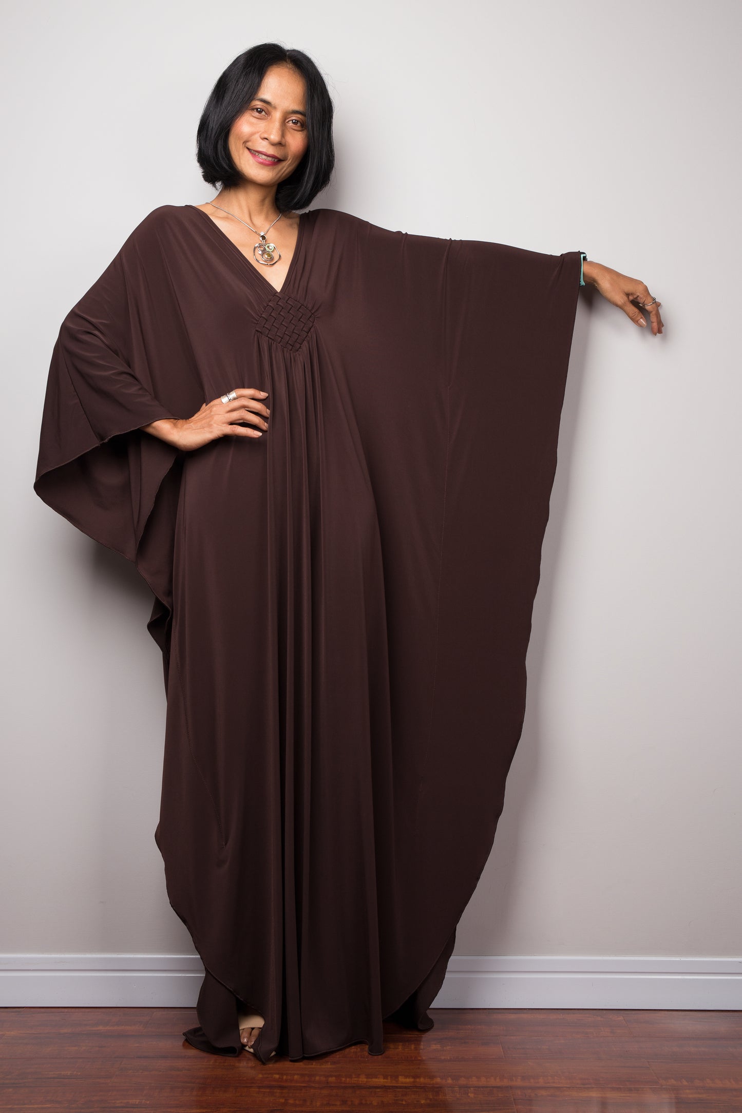 Elegant brown caftan dress.  Nuichan offers timeless kaftans at affordable prices. Long styles dress.