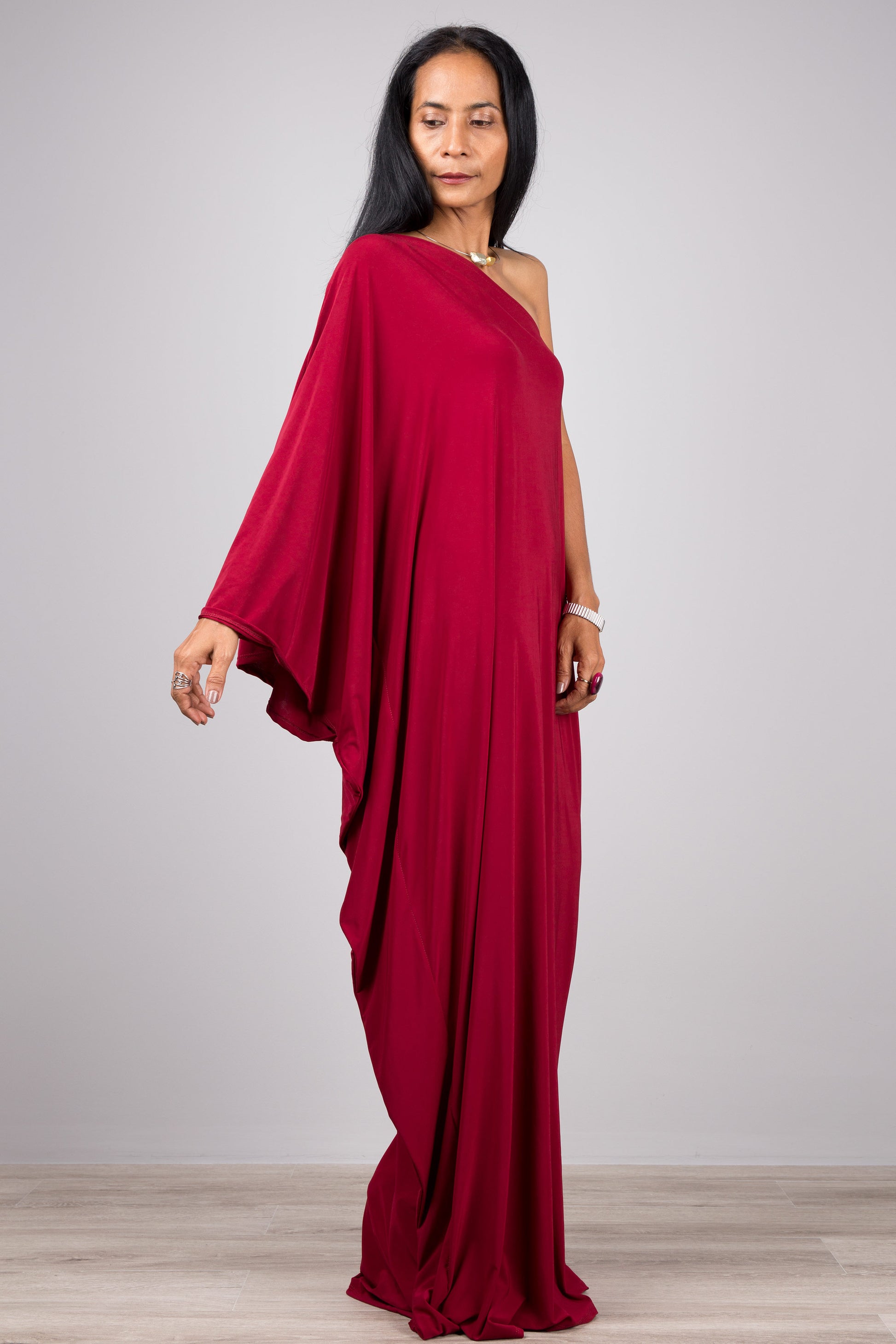 Long burgundy kaftan dress with a one shoulder sleeve