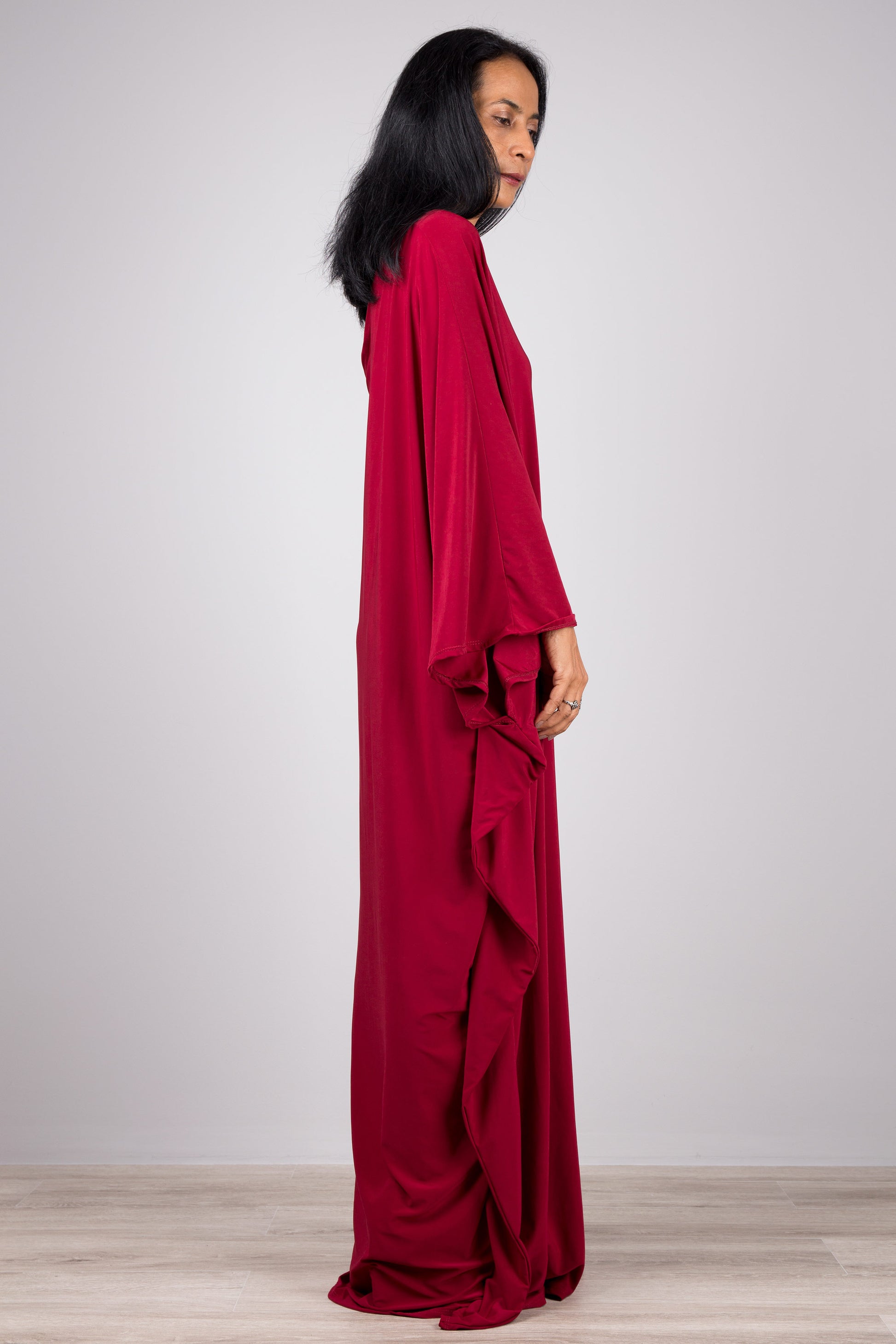 Long burgundy kaftan dress.  Off the shoulder dress. Side view