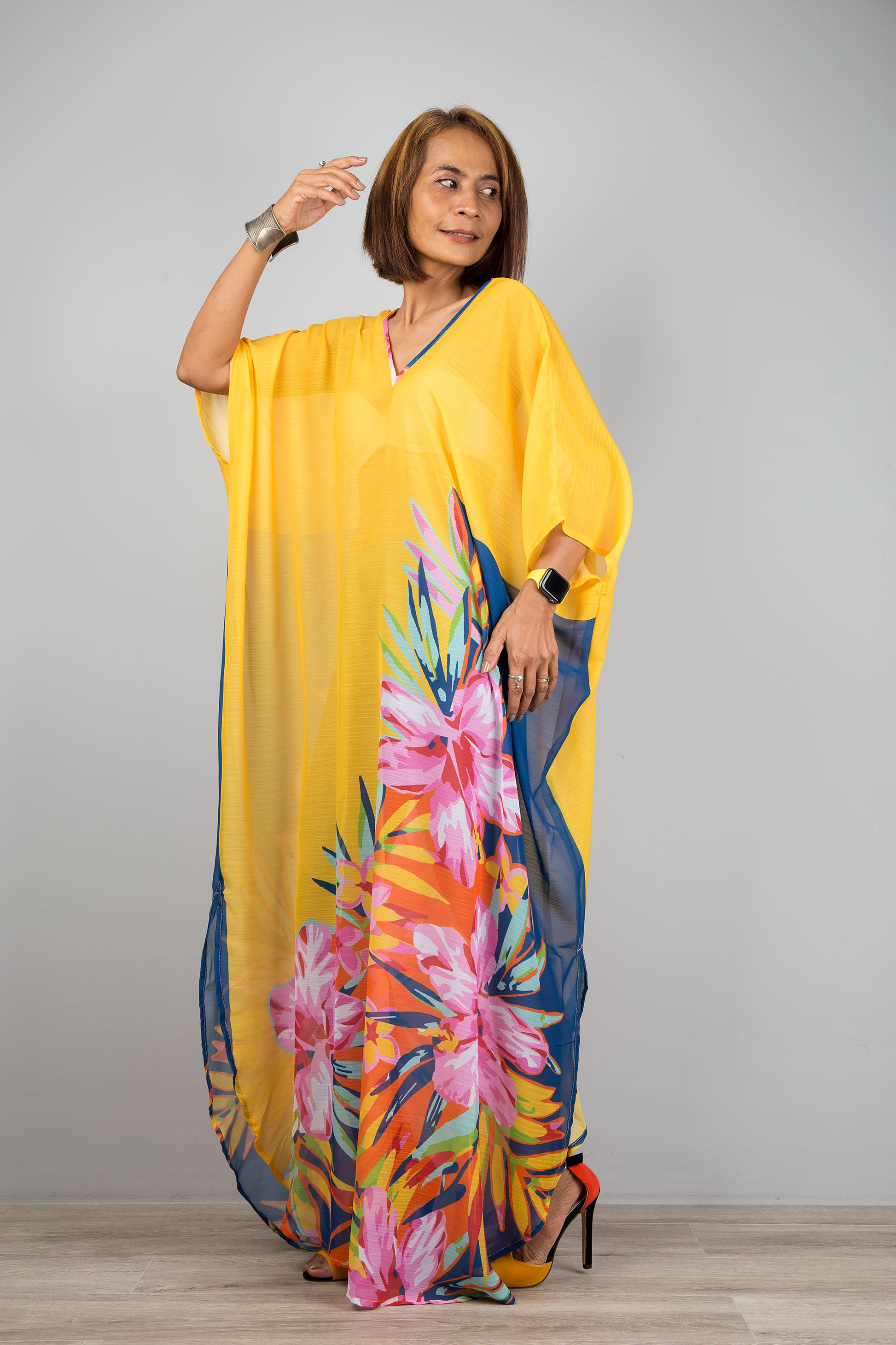 Yellow chiffon kaftan maxi dress with v neck.  See through beach dress with big floral print on the side. Design by Nuichan