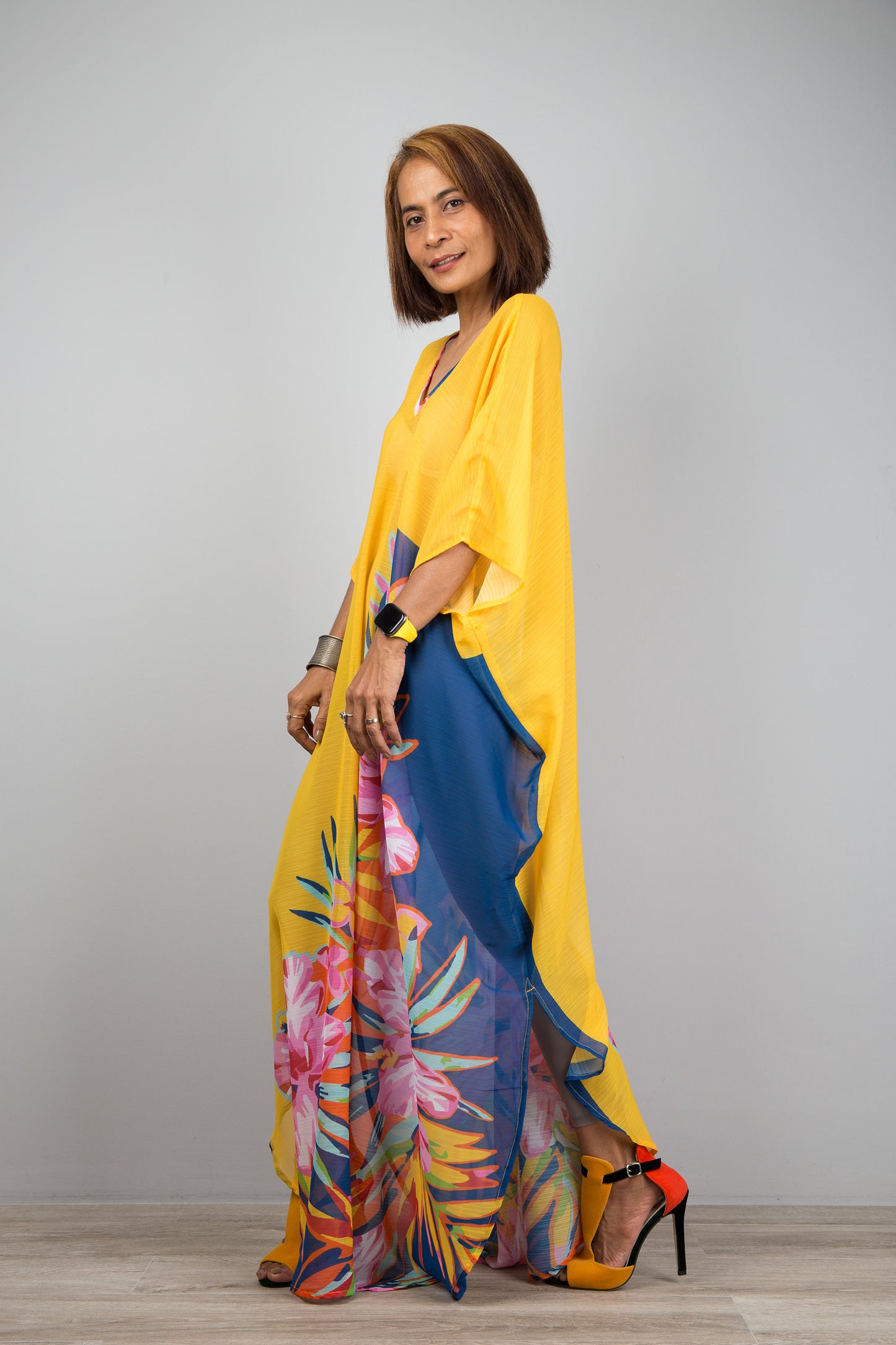 Yellow chiffon kaftan maxi dress with v neck.  See through beach dress with big floral print on the side. Design by Nuichan