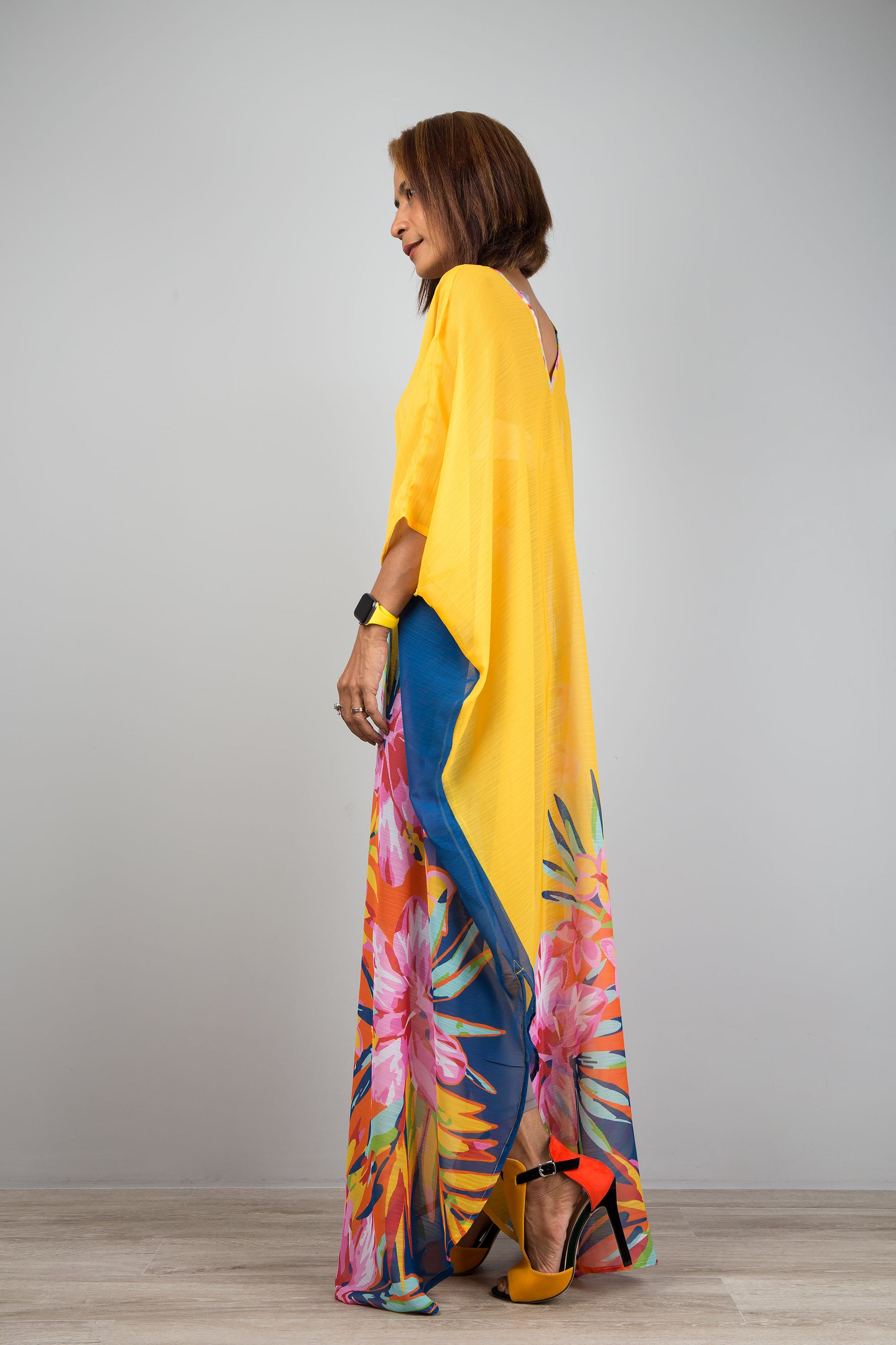 Yellow chiffon kaftan maxi dress with v neck.  See through beach dress with big floral print on the side. Design by Nuichan