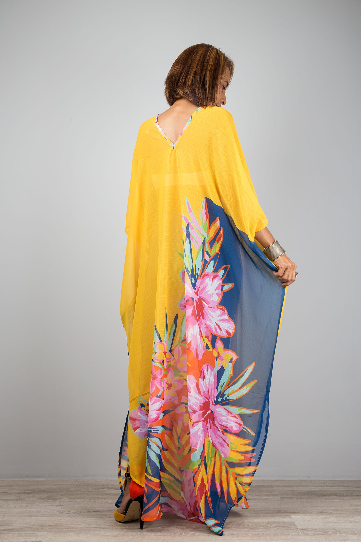 Yellow chiffon kaftan maxi dress with v neck.  See through beach dress with big floral print on the side. Design by Nuichan