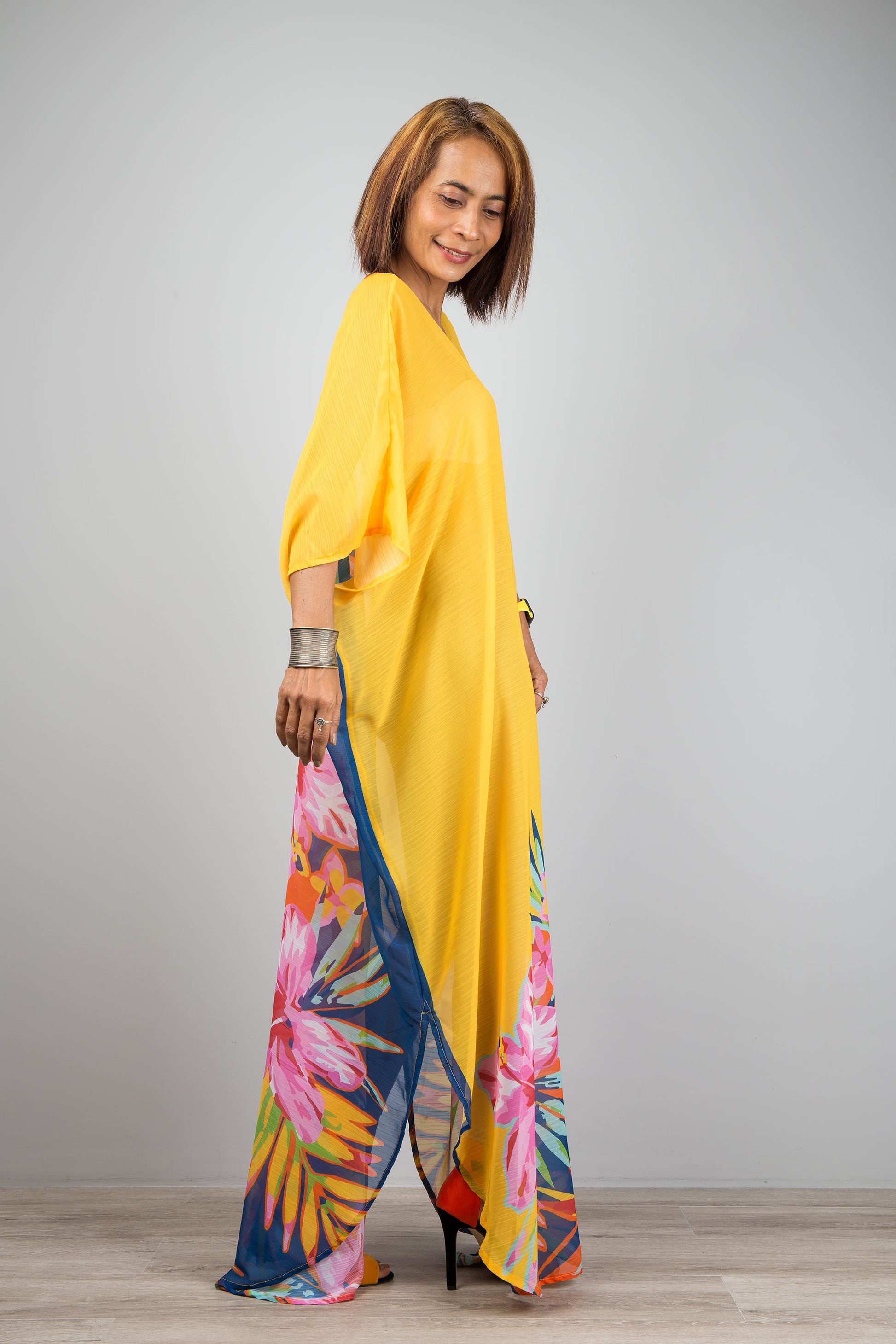 Yellow chiffon kaftan maxi dress with v neck.  See through beach dress with big floral print on the side. Design by Nuichan