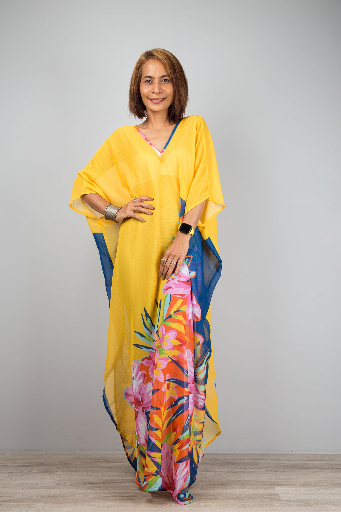 Yellow chiffon kaftan maxi dress with v neck.  See through beach dress with big floral print on the side. Design by Nuichan