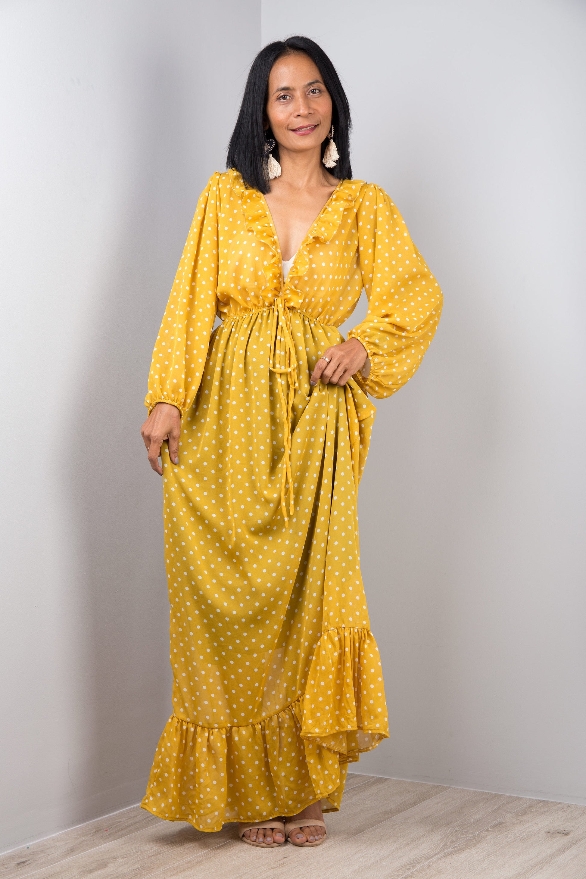 Yellow chiffon maxi dress with ruffle at the bottom hem.  Polka dot print