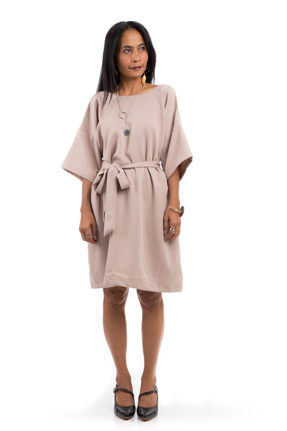 Short summer dress with half length sleeves.  Modest neckline with waistband accent.  Above the knee length dress.