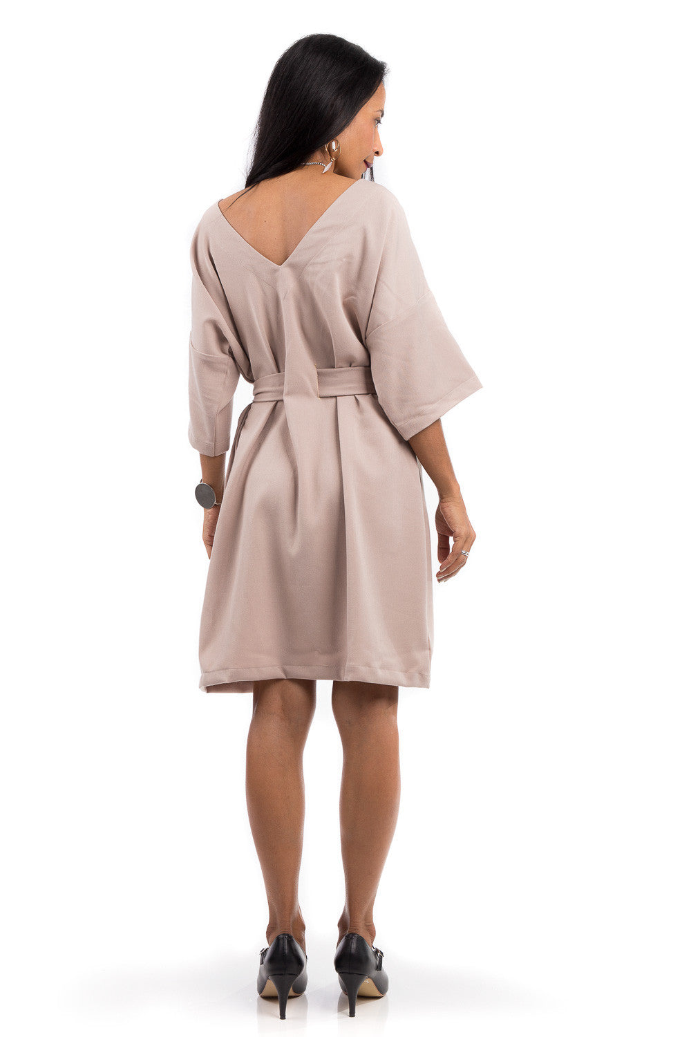 Short summer dress with half length sleeves.  Modest neckline with waistband accent.  Above the knee length dress.