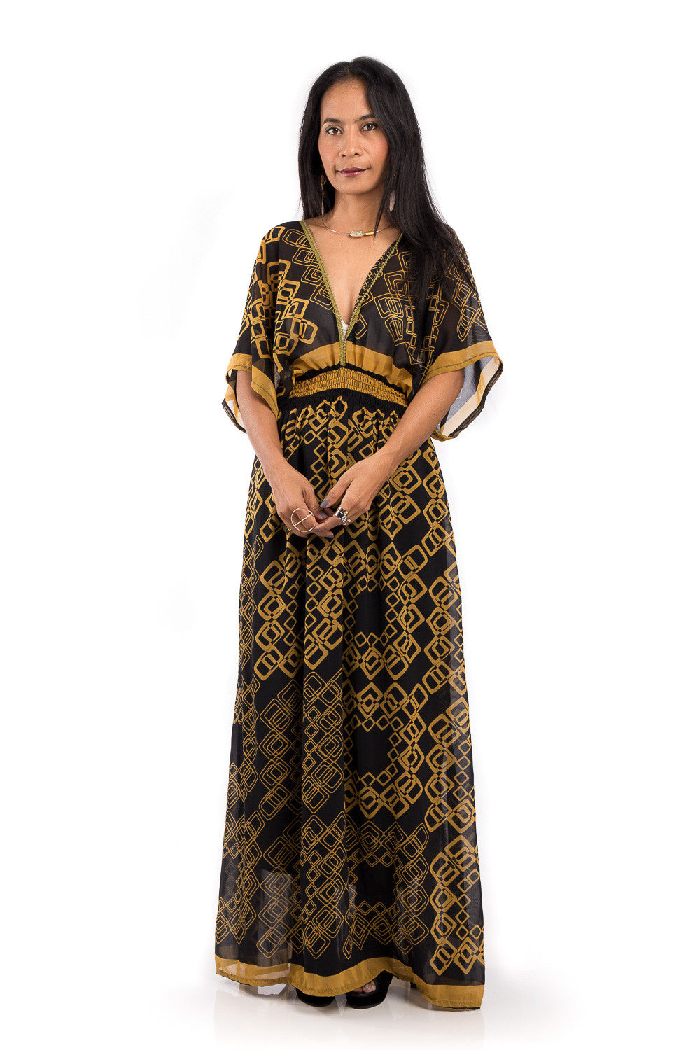 Boho summer dress.  Chiffon maxi dress with plunging neck line on front and back.  Golden yellow print on black fabric.  Smocked waist to ensure good fit.  Kimono inspired dress by Nuichan