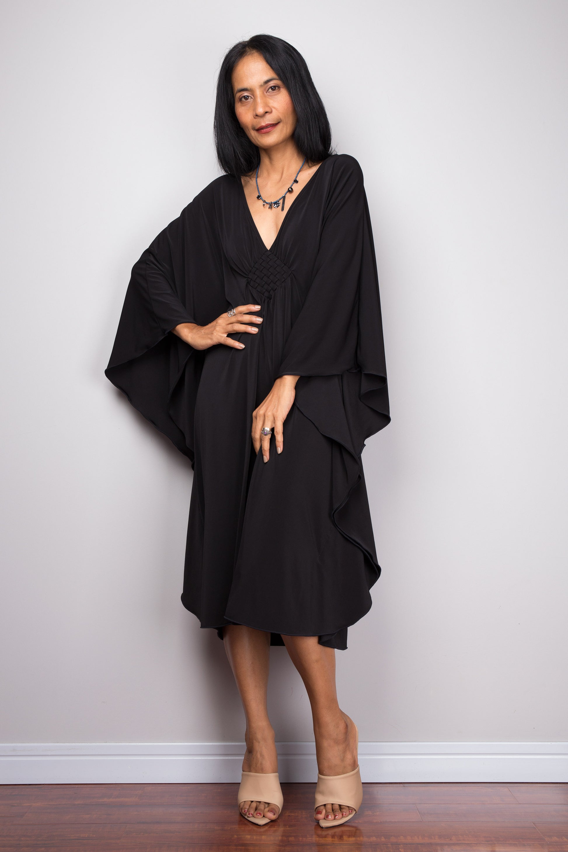 Black midi kaftan dress by Nuichan.  Buy short black dress online