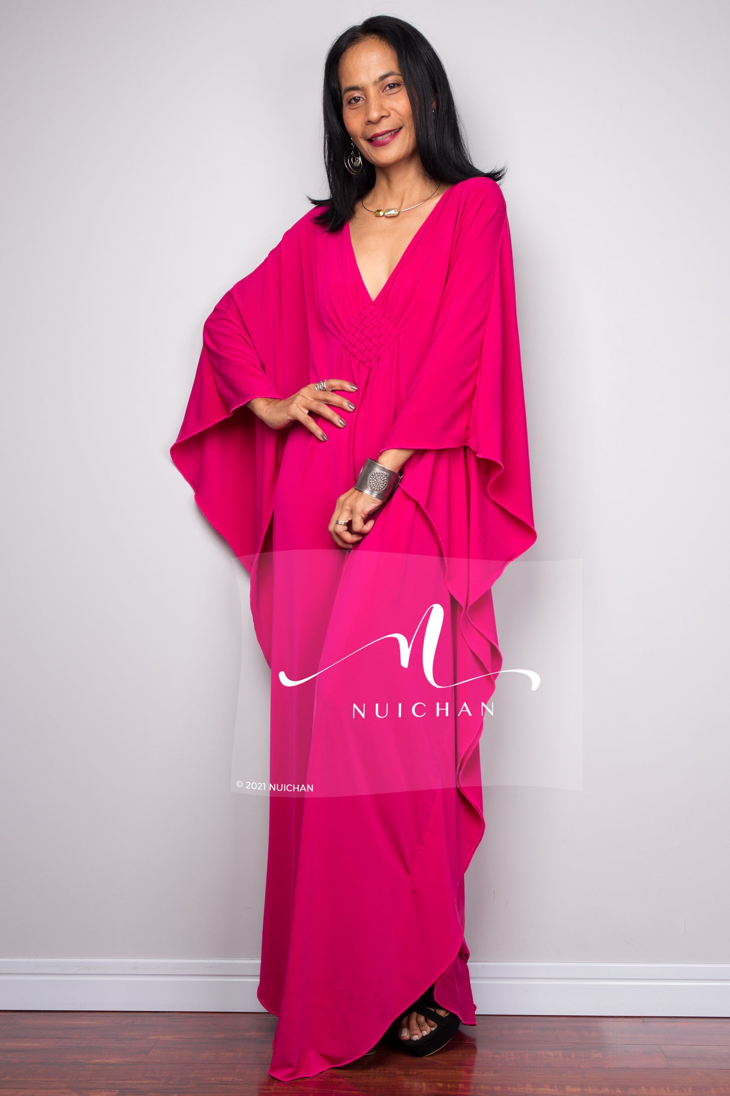 Pink kaftan dress with v neck and batwing sleeves