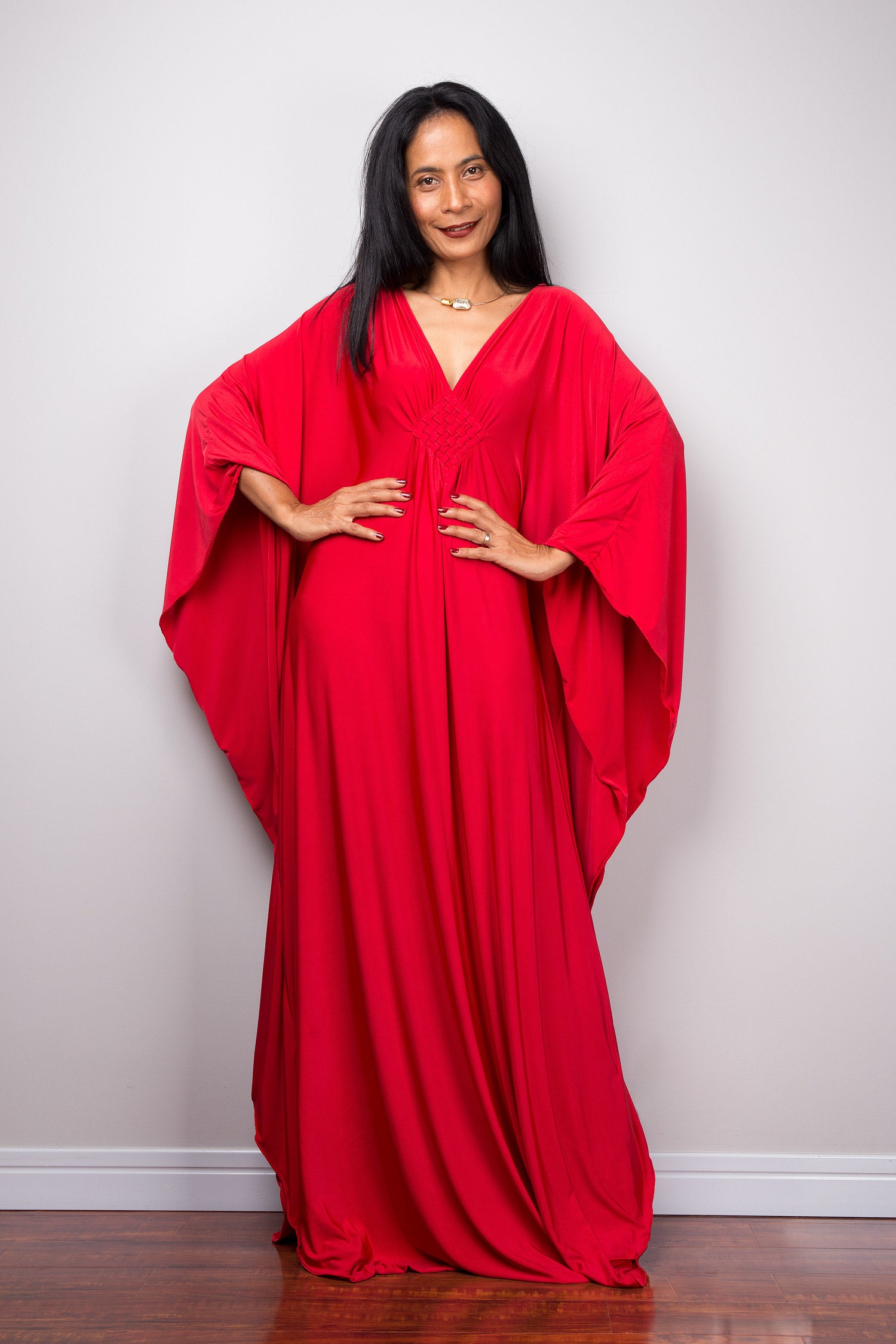 Long red kaftan dress by Nuichan.  Plus size kaftan dress with plunging neckline - front view