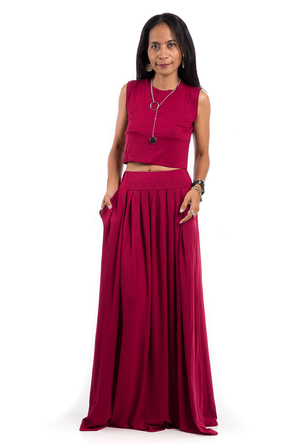 Red maxi skirt.  Long pleated skirt with high waist band and pockets on either side. 