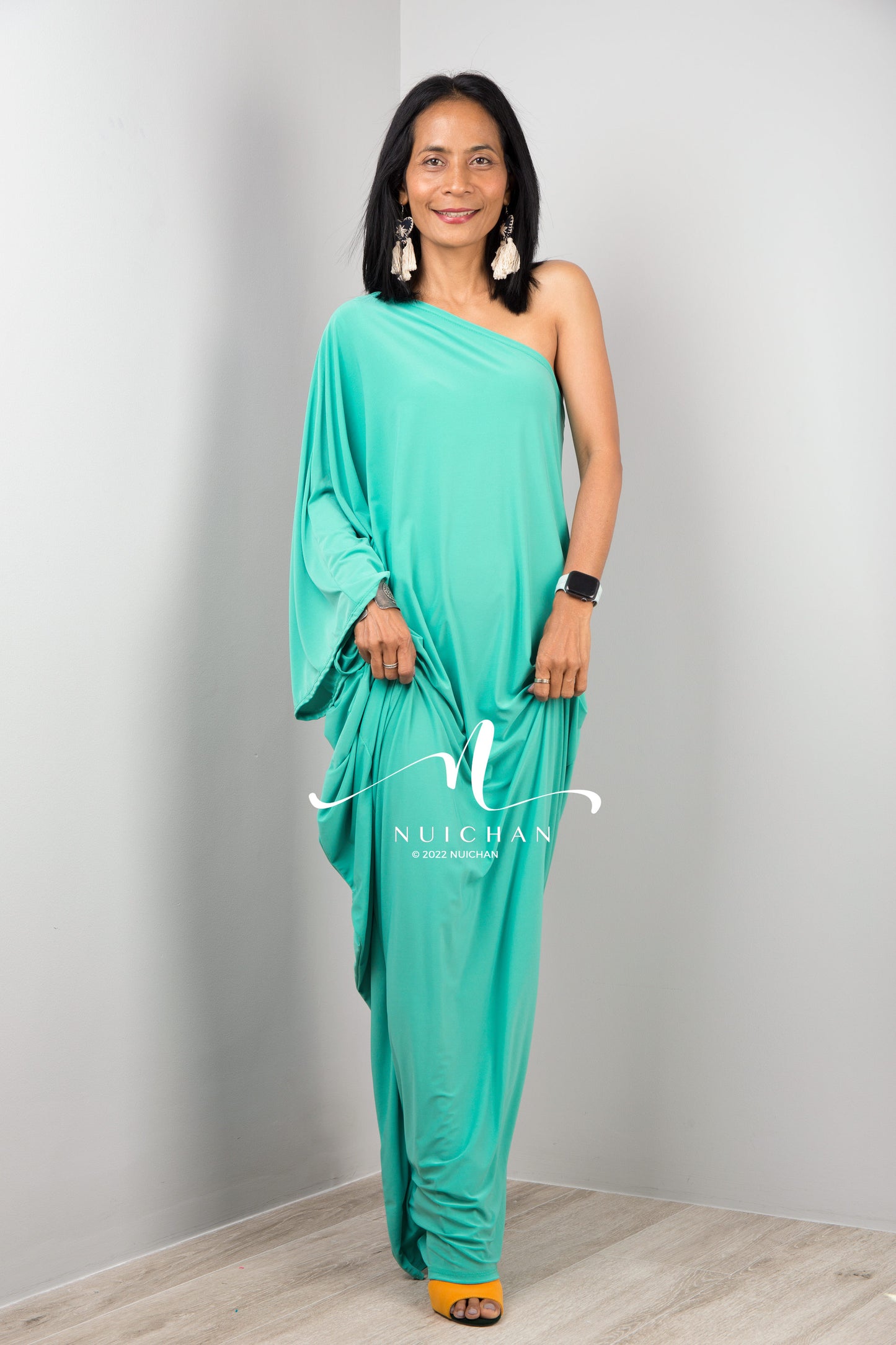 Mint green one shoulder dress by Nuichan.  Asymmetrical evening dress