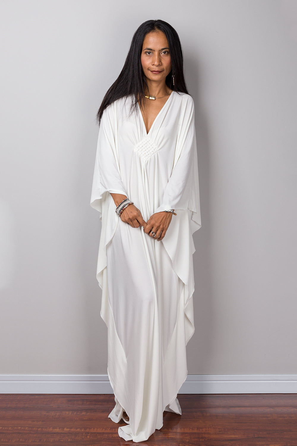 Large white kaftan dress online.  Shop for white maxi dress by Nuichan.  White caftan dress with plunging neckline.