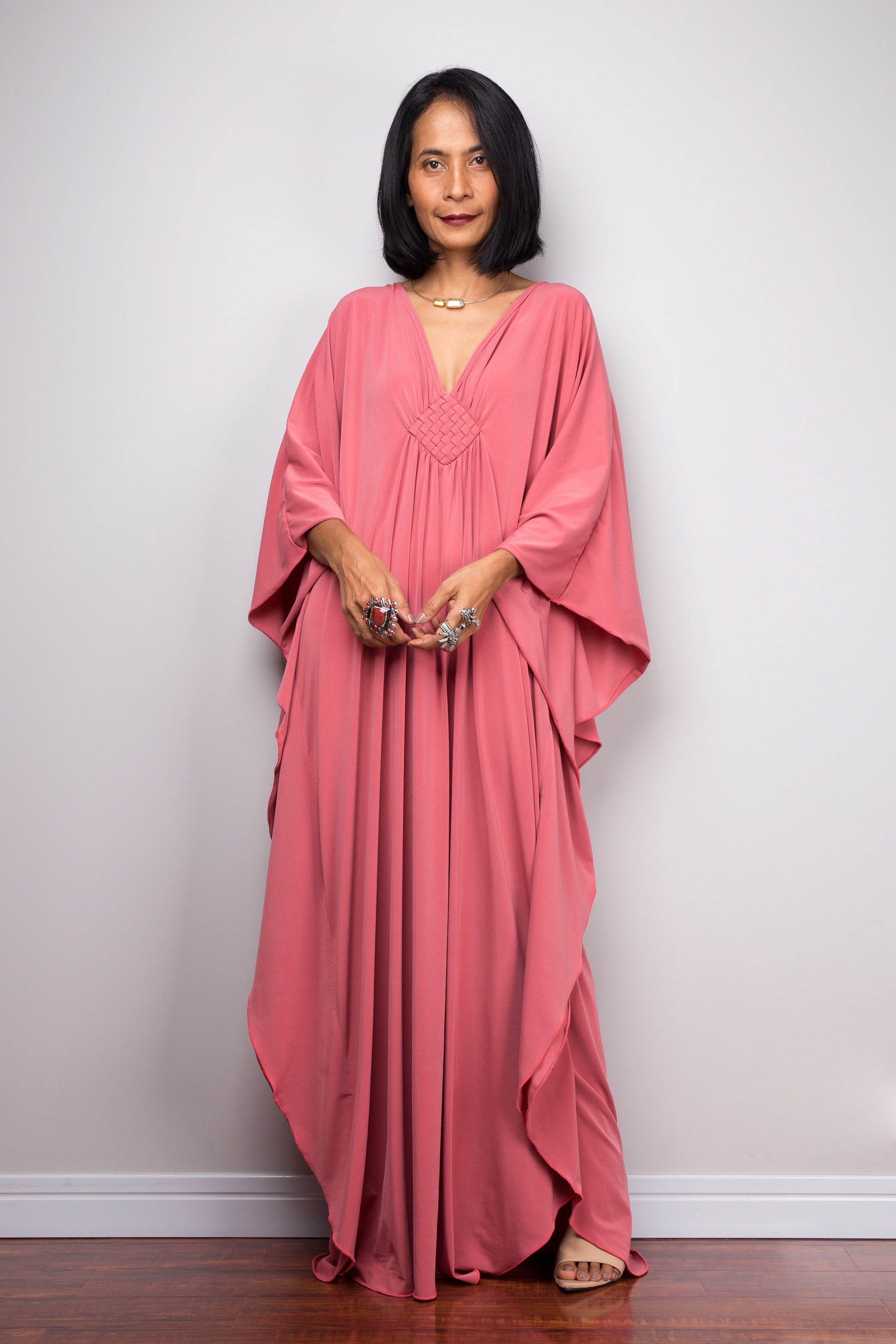 Antique pink kaftan with batwing sleeve design and v neck.