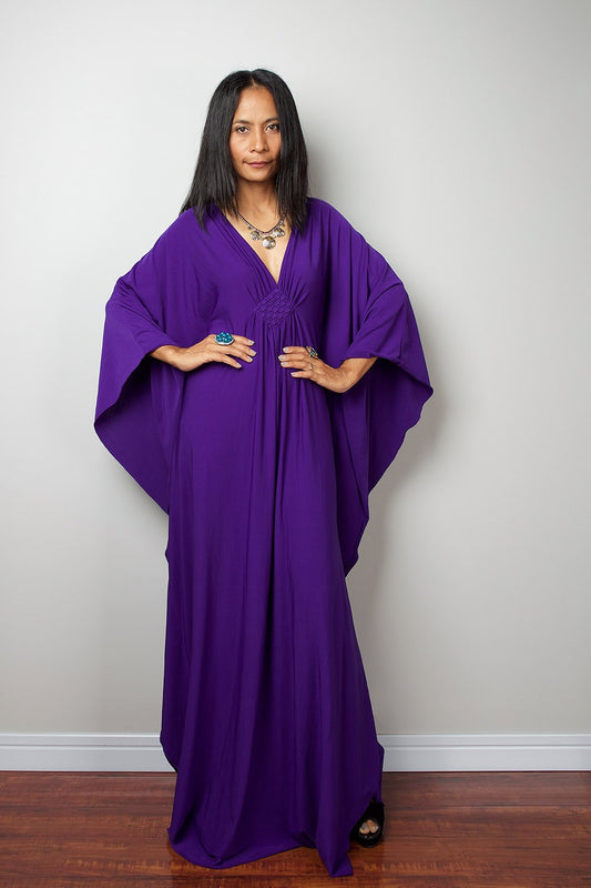 Purple kaftan dress.  Caftan with plunging neckline and embroidered diamond chest detail.