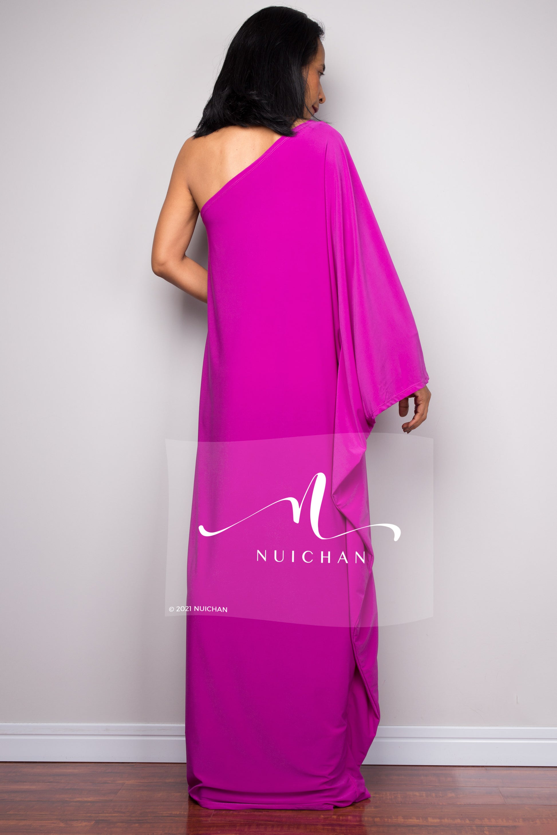 Purple evening dress with asymmetrical sleeve design