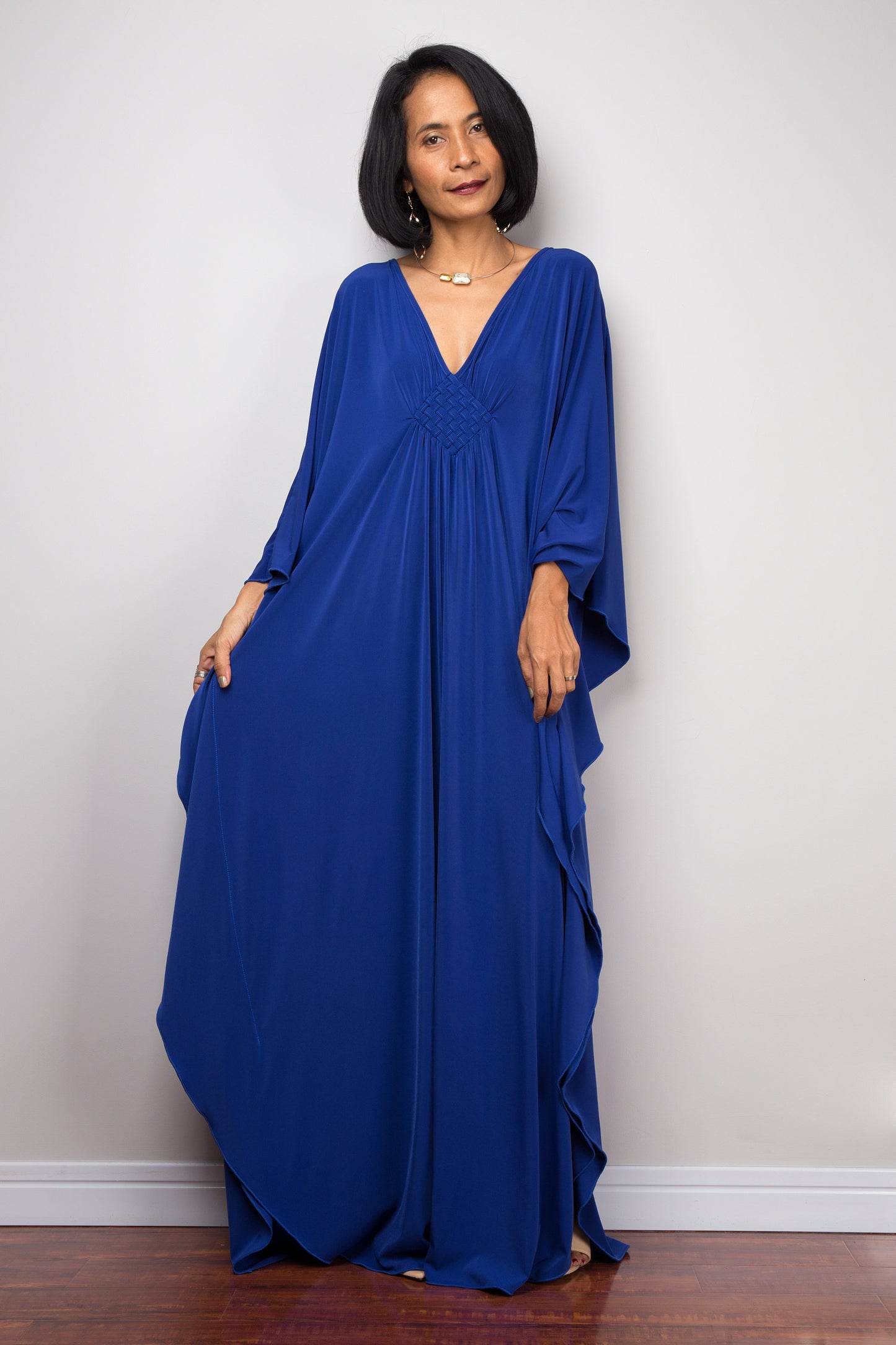 Blue kaftan dress with v neck and batwing sleeves - front view