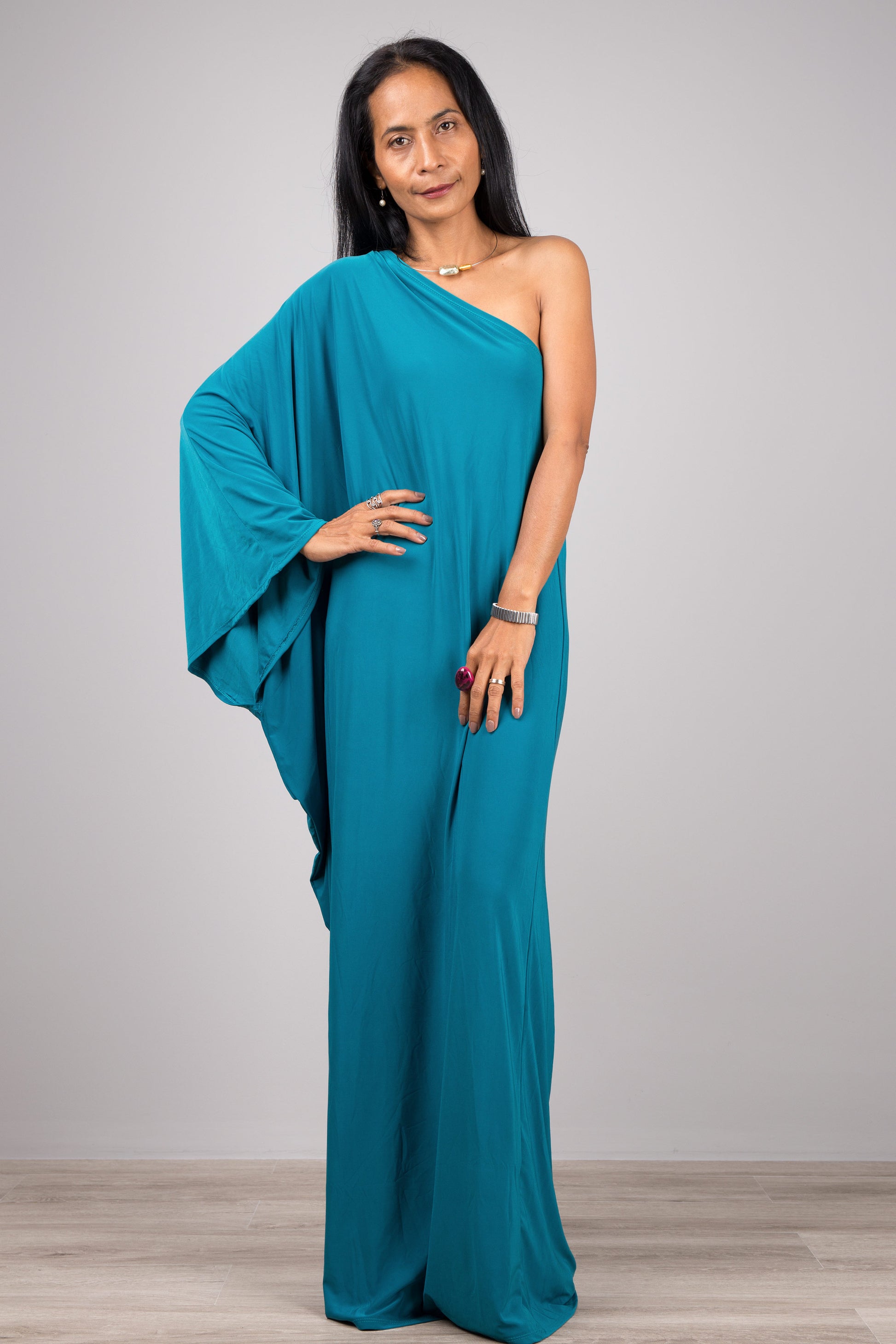 Teal one shoulder dress.  Off the shoulder maxi dress