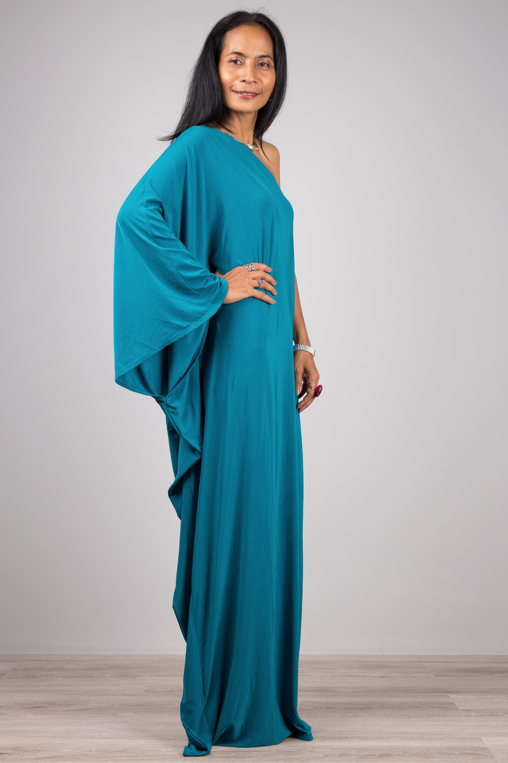 Teal off the shoulder maxi dress by Nuichan.  Long teal one shoulder dress.