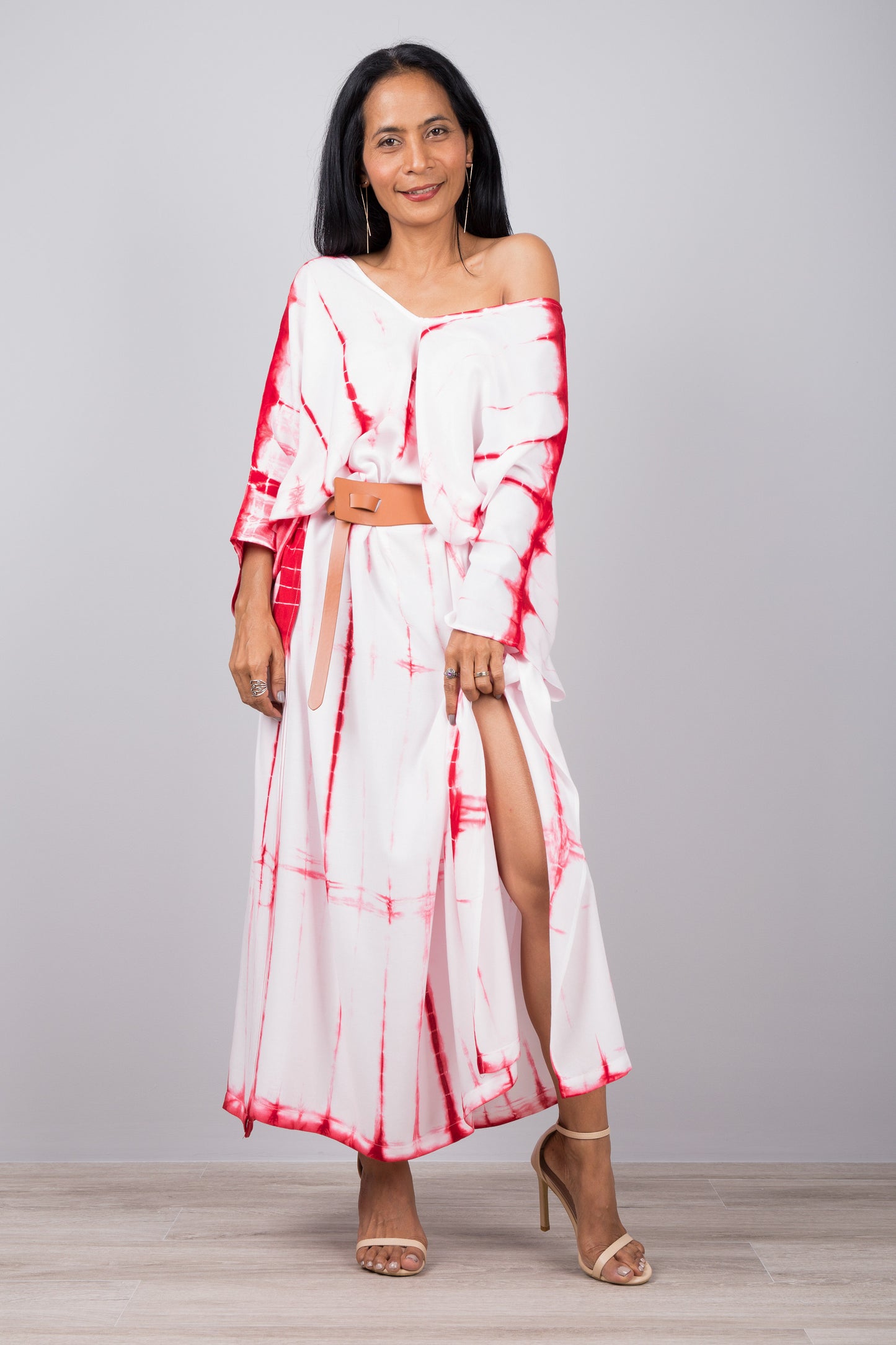 White and red tie dye kaftan. Shown here clinched with a belt at the waist