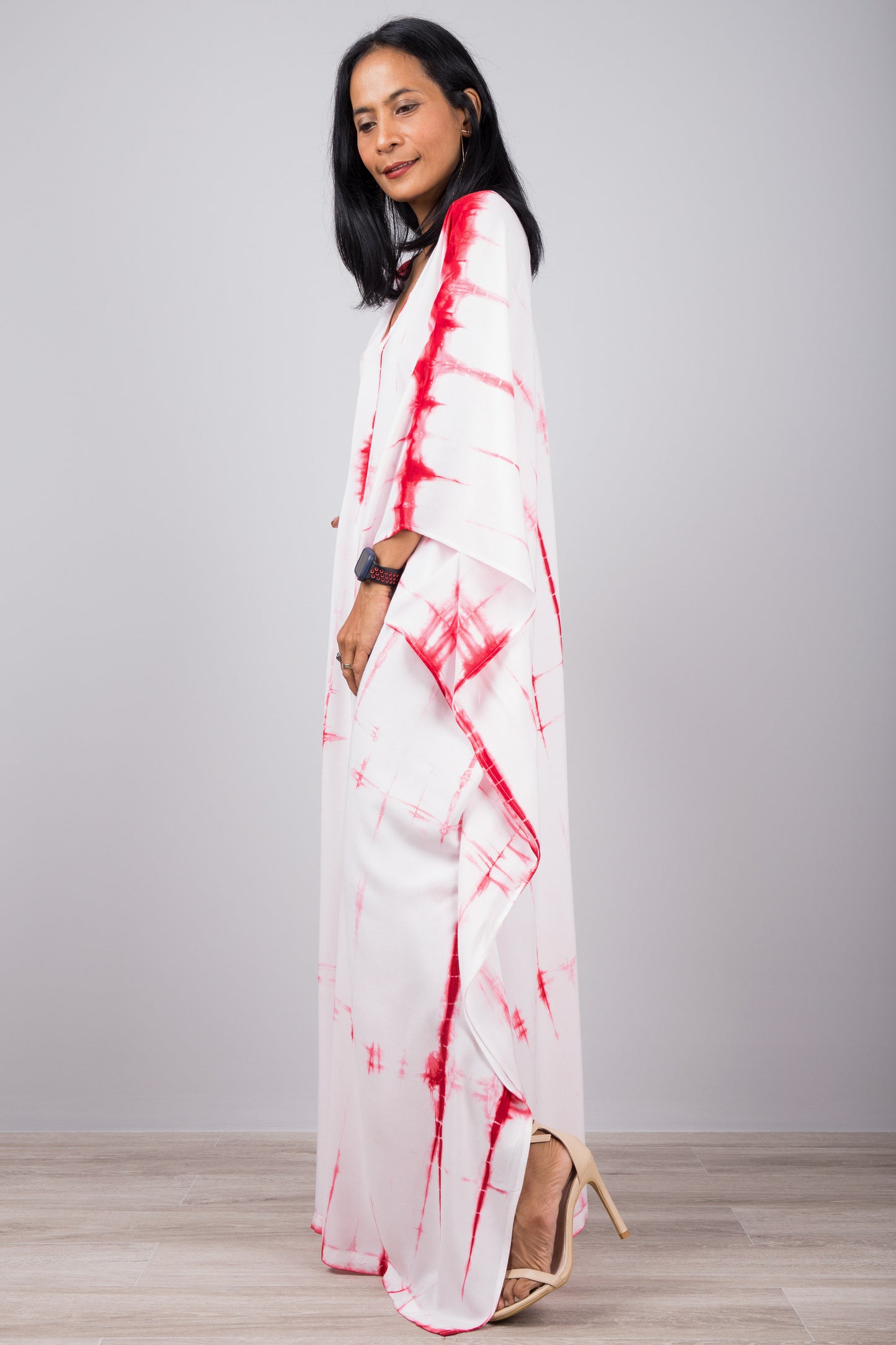 White an red tie dye dress. Side view