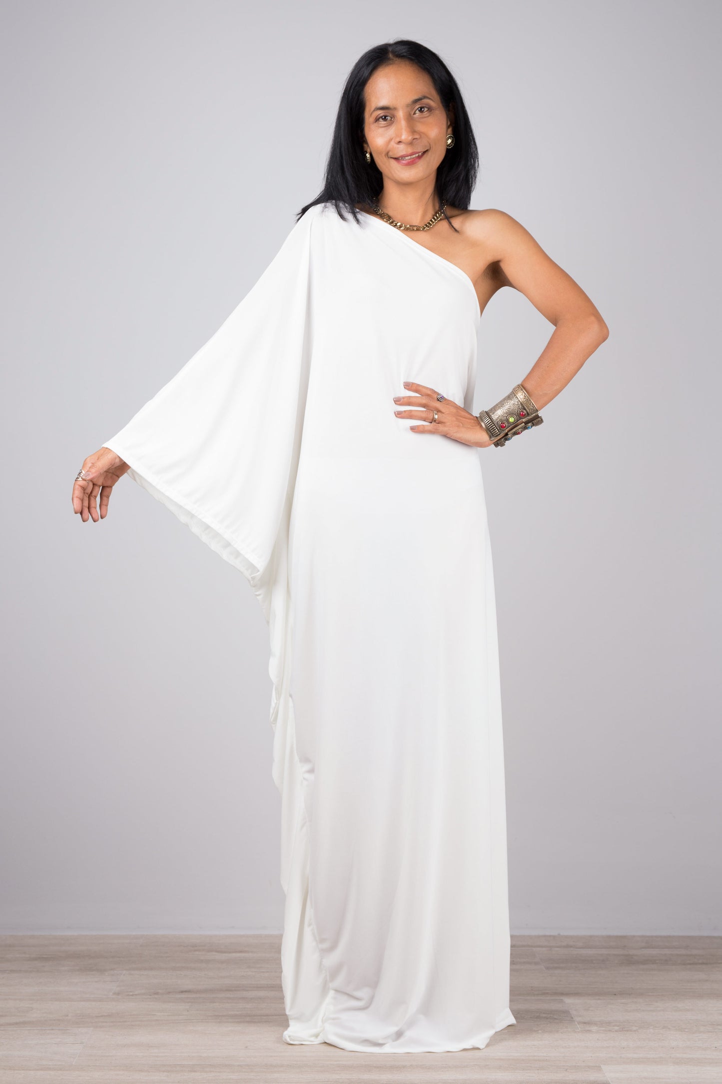 White off the shoulder dress.  Tube maxi dress with asymmetrical sleeve