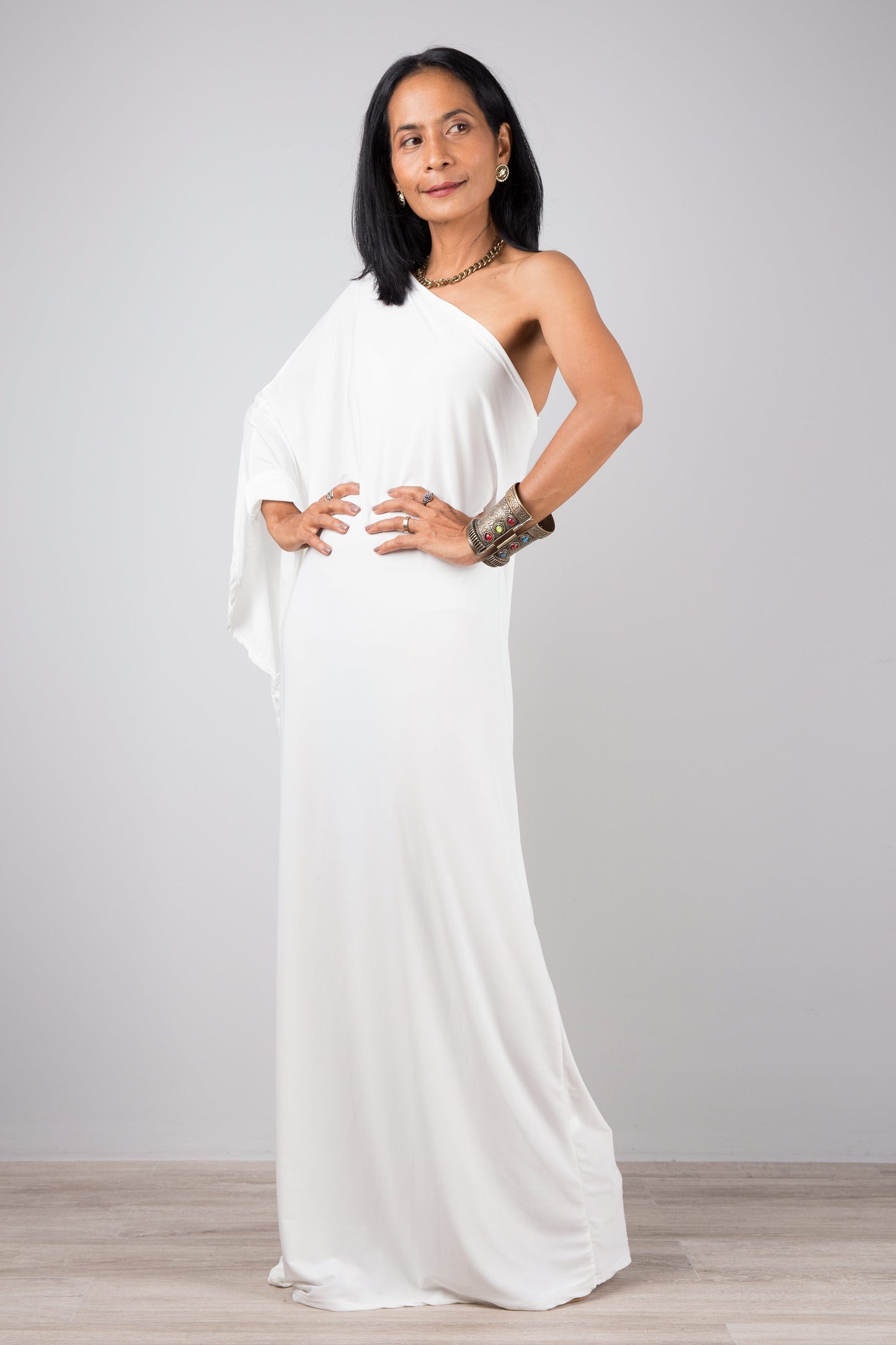 White one shoulder tube dress by Nuichan.  Off shoulder maxi dress